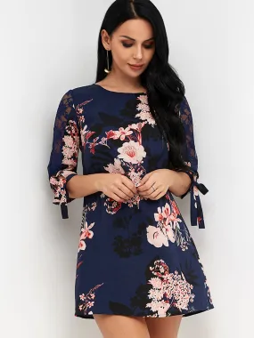 Wholesale Navy Round Neck 3/4 Sleeve Length Floral Print Lace See Through Self-Tie Mini Dresses